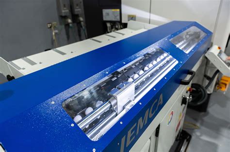 okuma lathe bar feeder